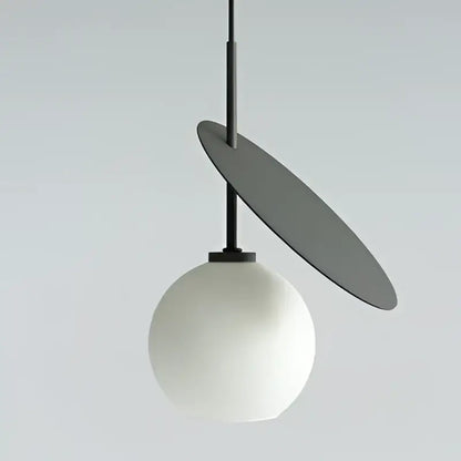 Modern red glass cherry led pendant light with matte white globe and gray disc, ideal for dining room decorbites cherry led