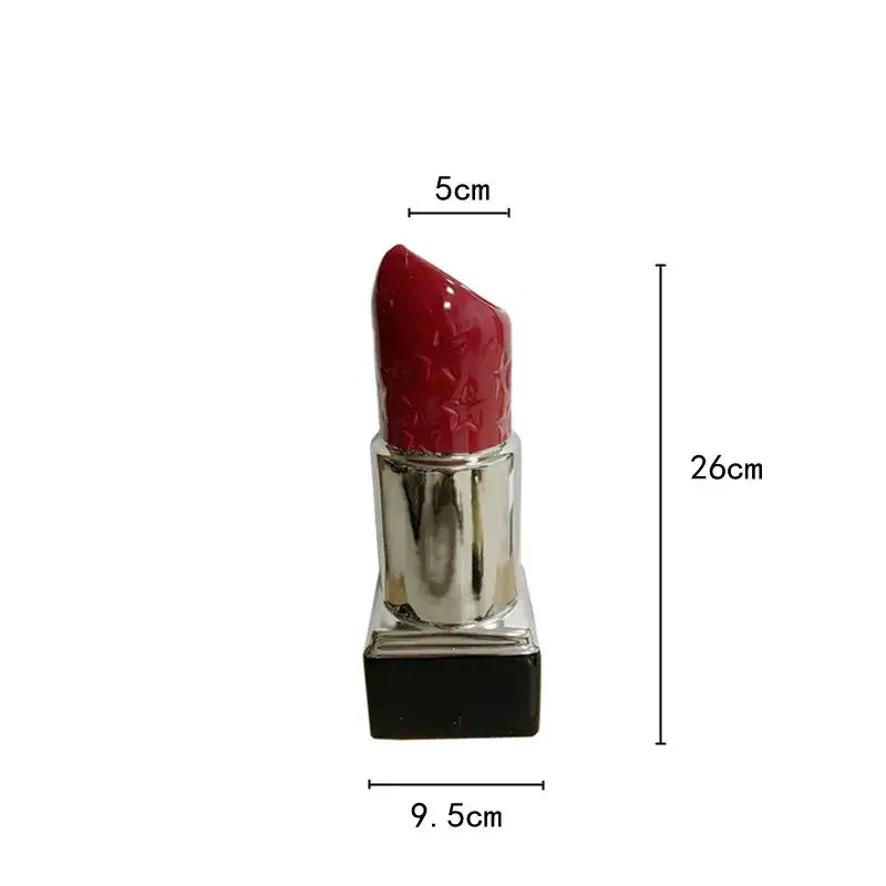 A glossy red lipstick shape ceramic vase with star-pattern texture in metallic silver and black for living room decorbites decor