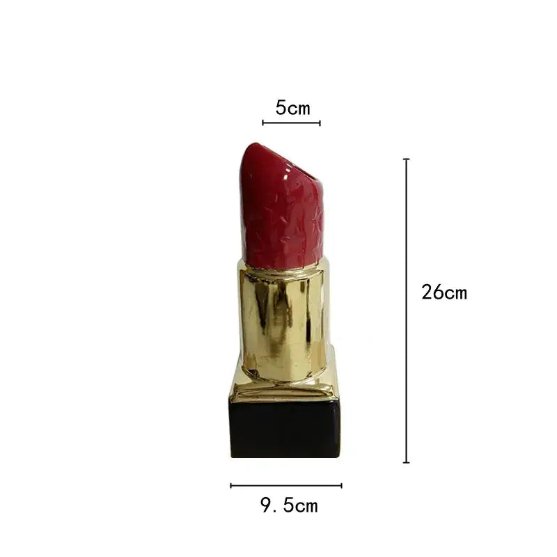 A glossy red lipstick shape ceramic vase with textured surface and gold casing for modern living room decorbites decor