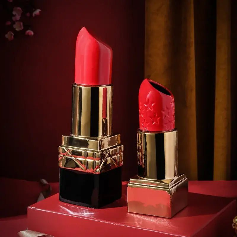 Two glossy red modern lipstick shape ceramic vases with gold and black bases for living room floral decorbites decor