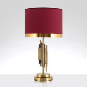 Decorbites red traditional fabric table light with deep red drum shade and gold-toned metallic base for living room