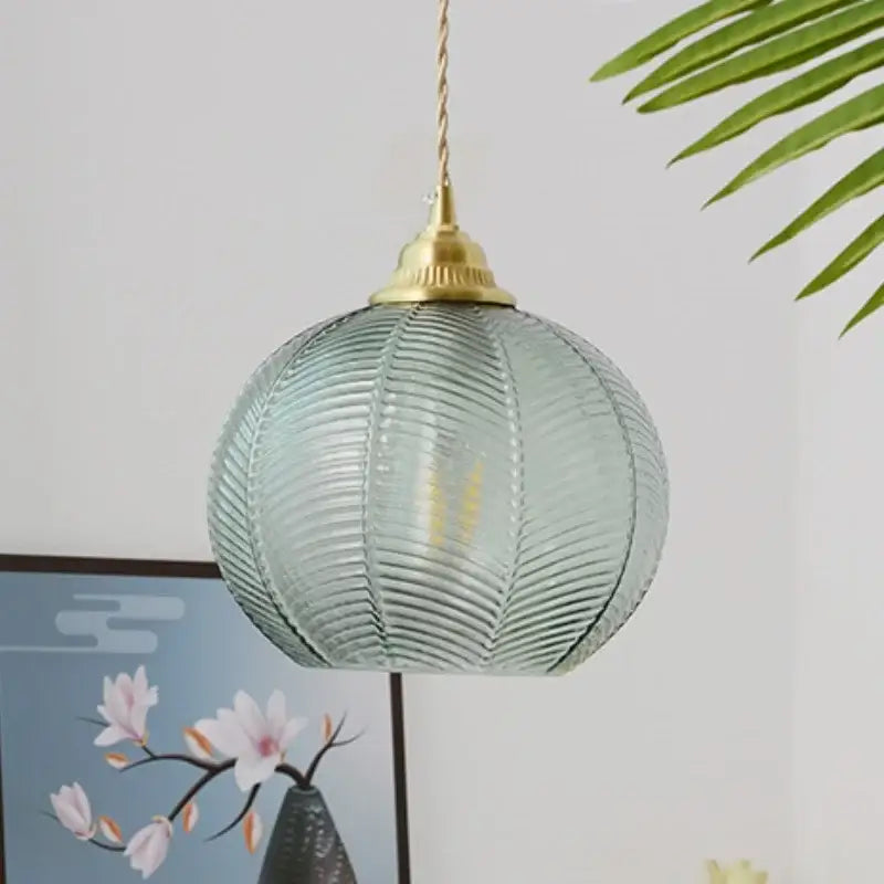 Modern ribbed blue glass led pendant lamp with vertical texture and brass finish metal top for dining room lighting decorbites blue glass