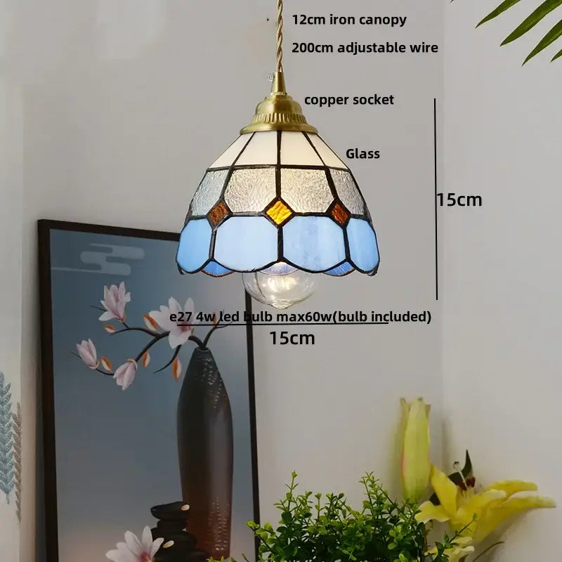 Modern ribbed blue glass led pendant lamp with tiffany-style stained glass decorbites blue glass panels and brass canopy