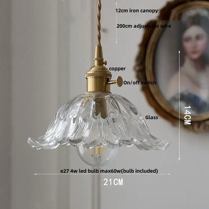 Modern ribbed blue glass pendant light with fluted petal design and brass copper hardware for dining room decorbites blue glass