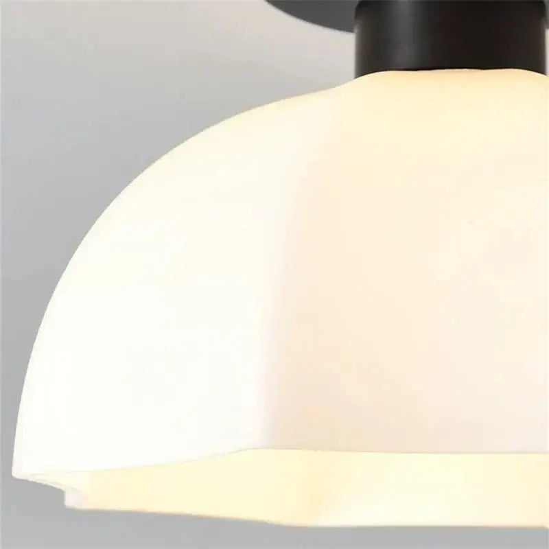 Modern ribbed ceramic glass chandelier with off-white frosted glass dome and matte black metal fixture decorbites ceramic glass