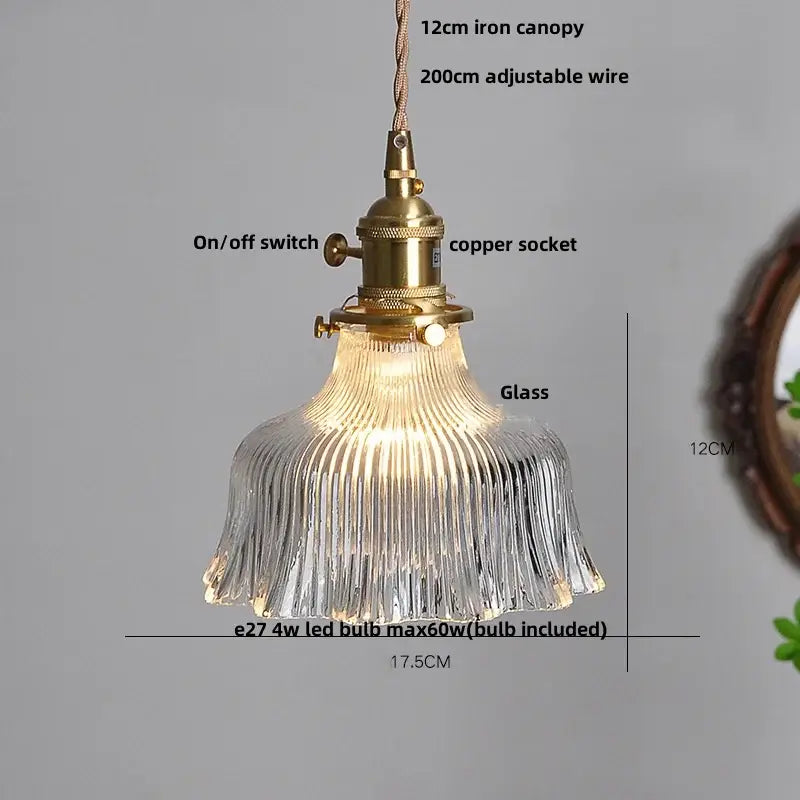 Vintage-style pendant light with clear ribbed glass led shade and brass decorbites clear glass kitchen fixture