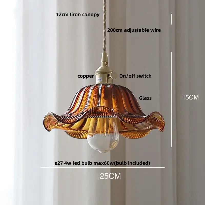 Amber-colored hand-blown pendant light with fluted clear glass led design and copper-finished iron canopy by decorbites clear glass