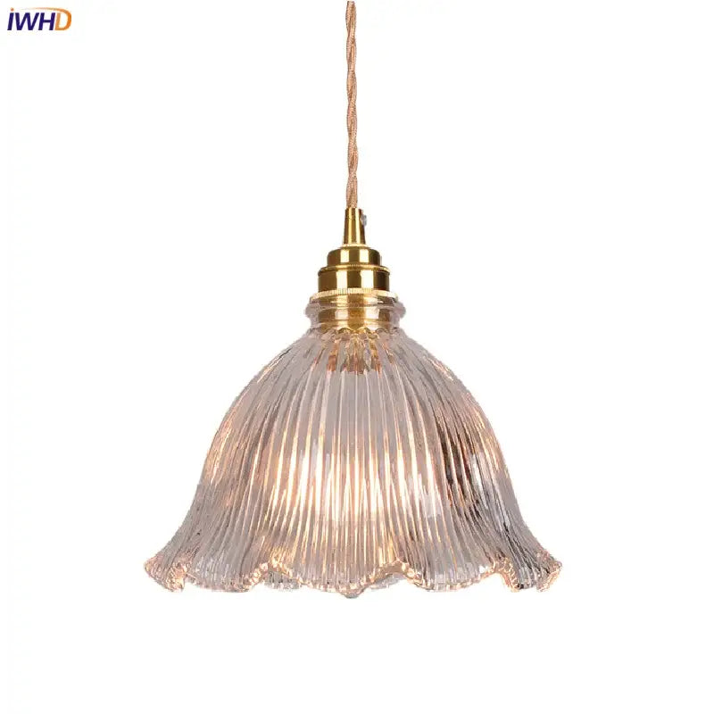 Modern ribbed clear glass pendant light with brass fixture and twisted copper cord for kitchen decorbites clear glass design