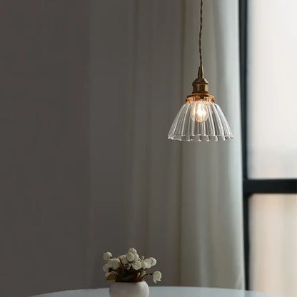 Modern ribbed clear glass pendant light with brass metal fixture and cord perfect for kitchen decorbites light fixture