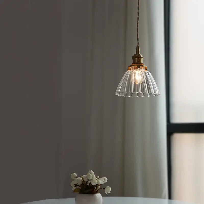 Modern ribbed clear glass pendant light with brass metal fixture and cord perfect for kitchen decorbites light fixture