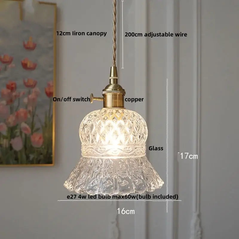 Modern ribbed clear glass pendant light with brass-finished copper fixture and adjustable braided wire by decorbites clear glass