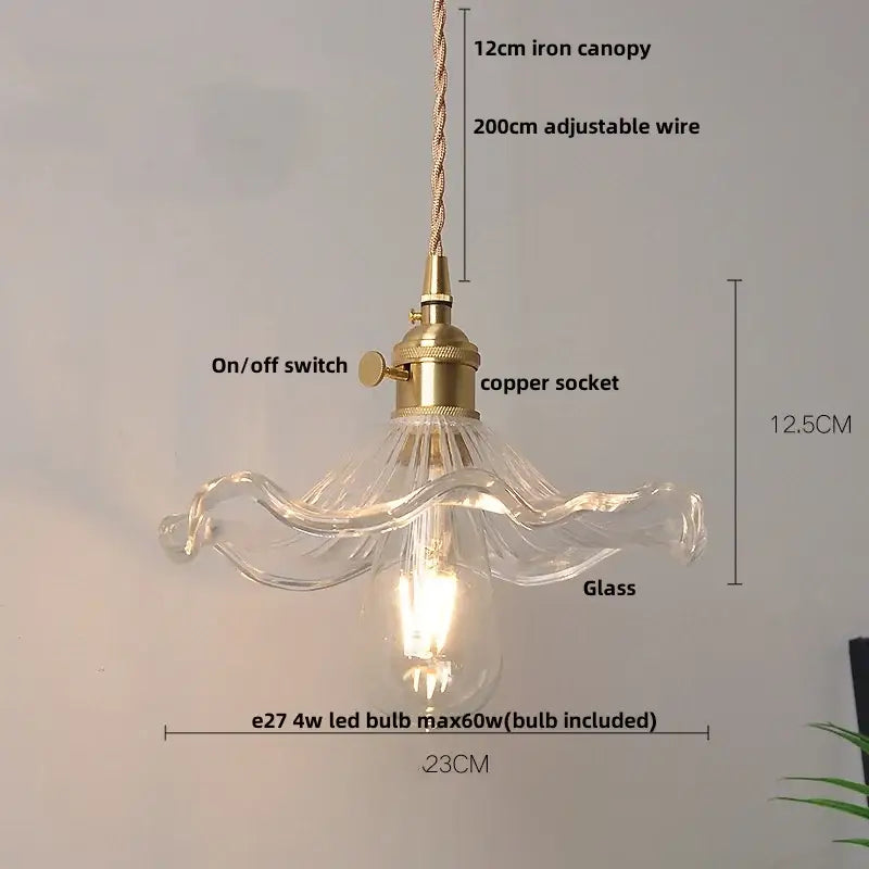 Modern ribbed clear glass pendant light with wavy design and brass fittings decorbites clear glass light fixture