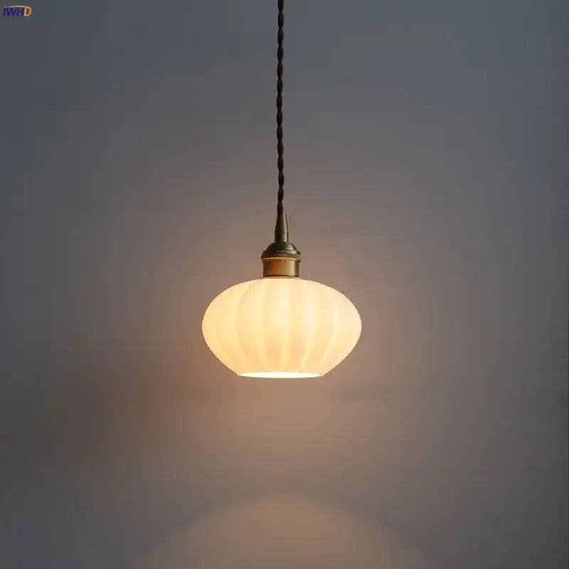 Modern ribbed copper white glass pendant lamp with warm-toned glass and brass fixture for living room decorbites decor