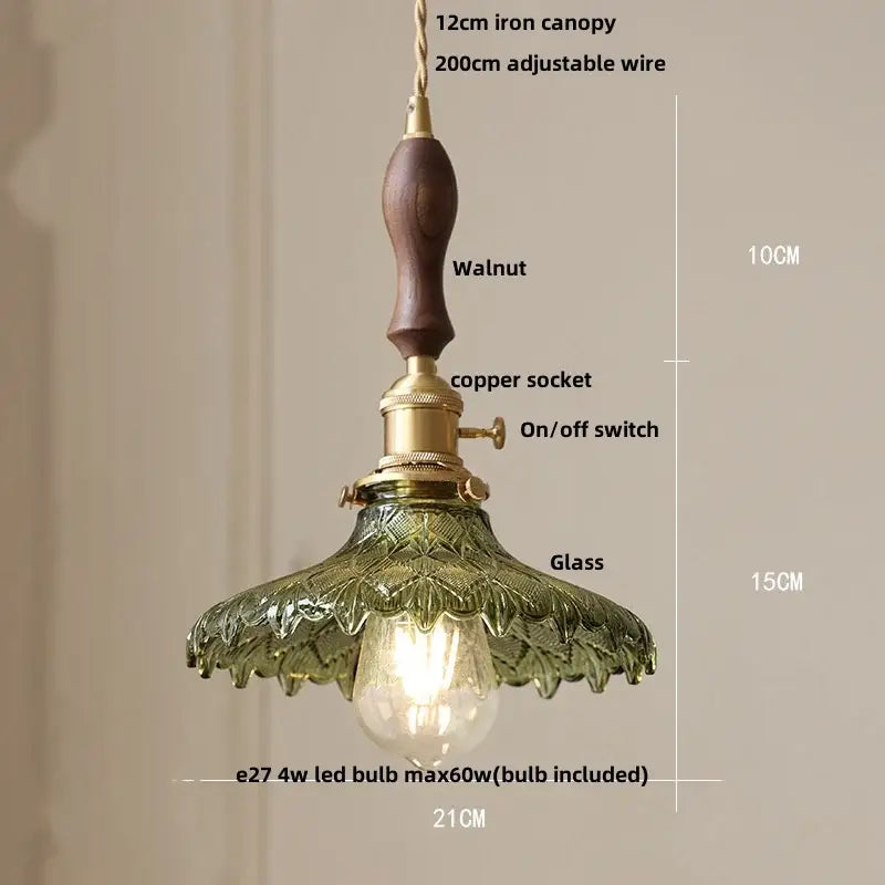 Modern ribbed glass brass led pendant light with dark walnut handle and ornate green embossed shade for dining room decorbites brass led