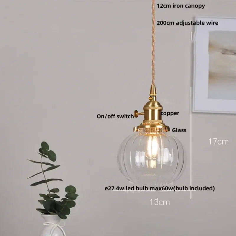 Modern ribbed glass brass led pendant light with clear globe and brass hardware for dining room decorbites brass led pendant