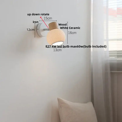 Modern ribbed ceramic led wall light with white shade, natural wood cap, and iron base for bedroom decorbites ceramic led
