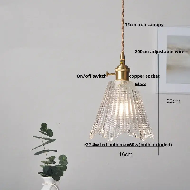 Modern ribbed glass led pendant light with clear faceted glass, brass iron canopy, and copper socket for kitchen use