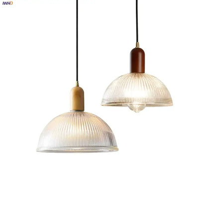 Two pendant lights with ribbed translucent glass led pendant shades and wood brass cylindrical fixtures for kitchen chandelier