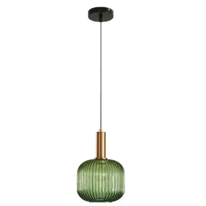 Modern ribbed green pumpkin glass pendant light with brass metal stem and black ceiling mount for dining room decorbites
