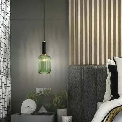 Modern ribbed green pumpkin glass pendant lights with black stem and gold-toned accent for dining room decorbites green pumpkin