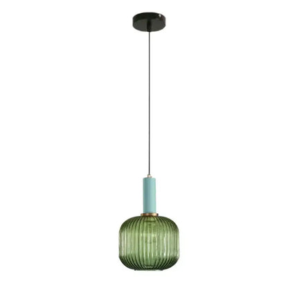 Modern ribbed green pumpkin glass pendant lights with a matte teal neck and black ceiling mount for dining room decorbites decor