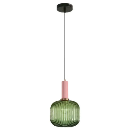 A modern decorbites green pumpkin pendant light with ribbed green pumpkin glass and pink accent for dining room decor