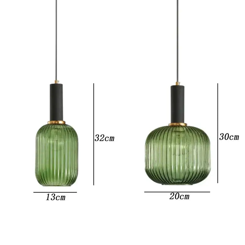 Modern ribbed green pumpkin glass pendant lights with black shades and gold accents for dining room decorbites green pumpkin