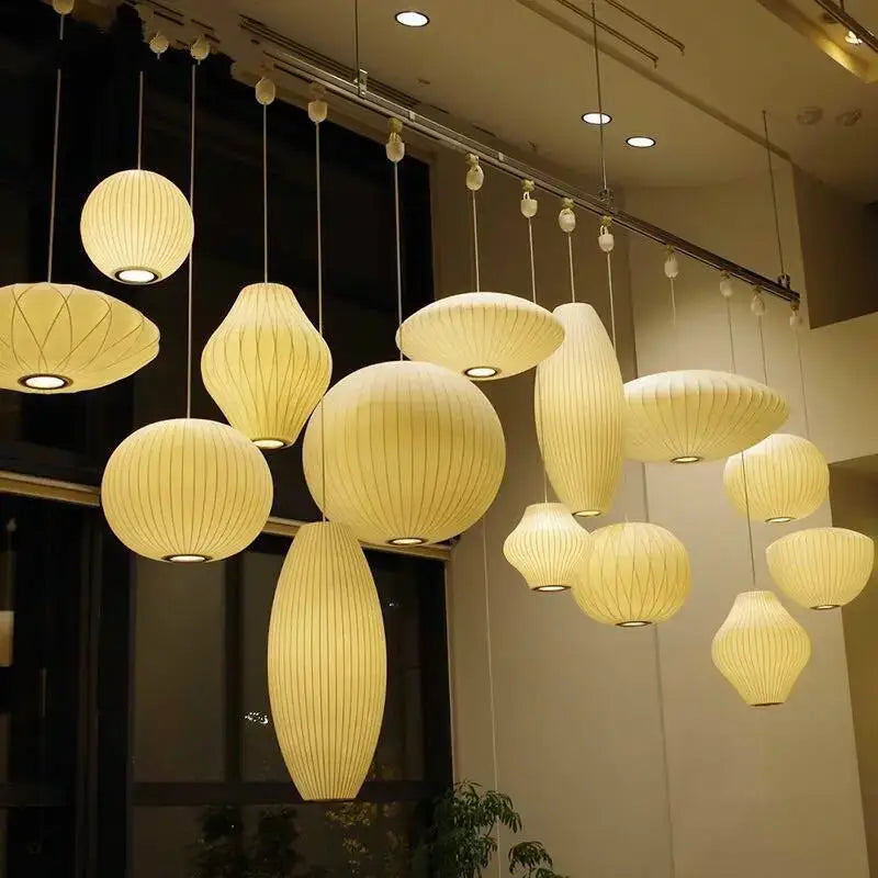 Warm cream-colored ribbed pendant lamp made of elegant silk designer material for living room decorbites elegant silk