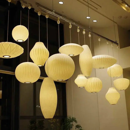 Warm cream-colored ribbed pendant lamp made of elegant silk designer material for living room decorbites elegant silk