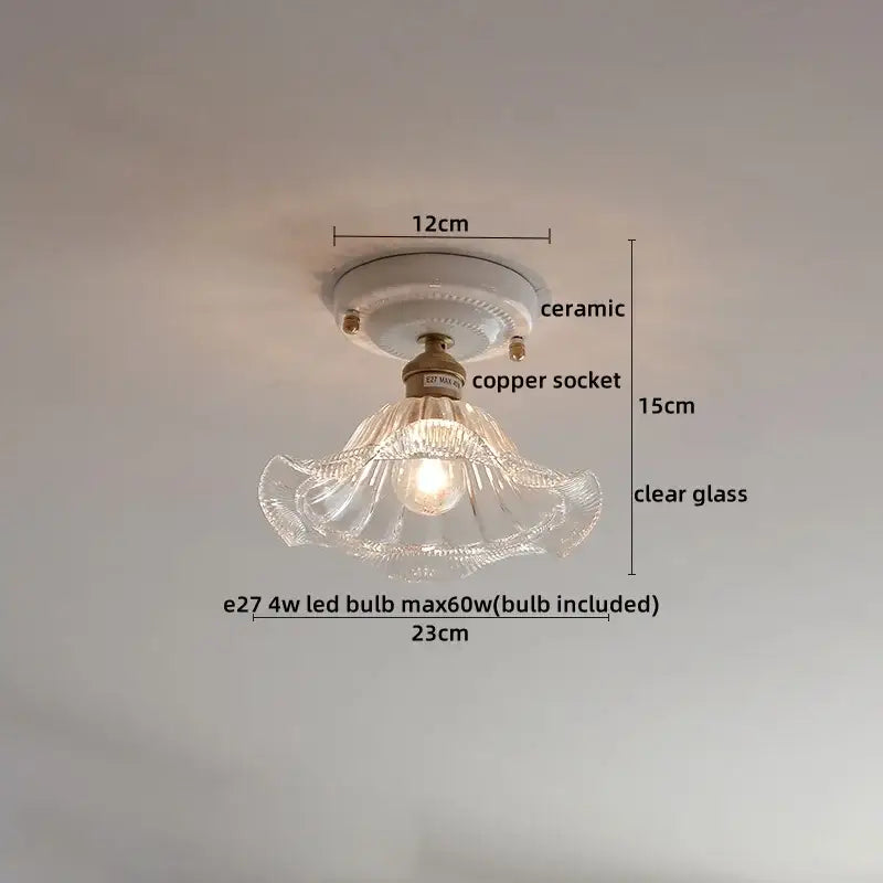 Modern ridged cream ceramic led ceiling light with delicate clear glass pendant and antique brass socket for living room decorbites ceramic led