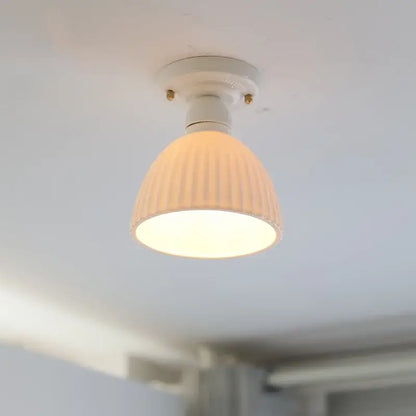 Modern ridged cream ceramic led ceiling light with vertical ridges and white mounting base for living room decorbites ceramic led
