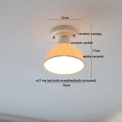 Modern ridged cream ceramic led ceiling light with a ribbed warm-toned shade and e27 led bulb for living room decorbites ceramic led