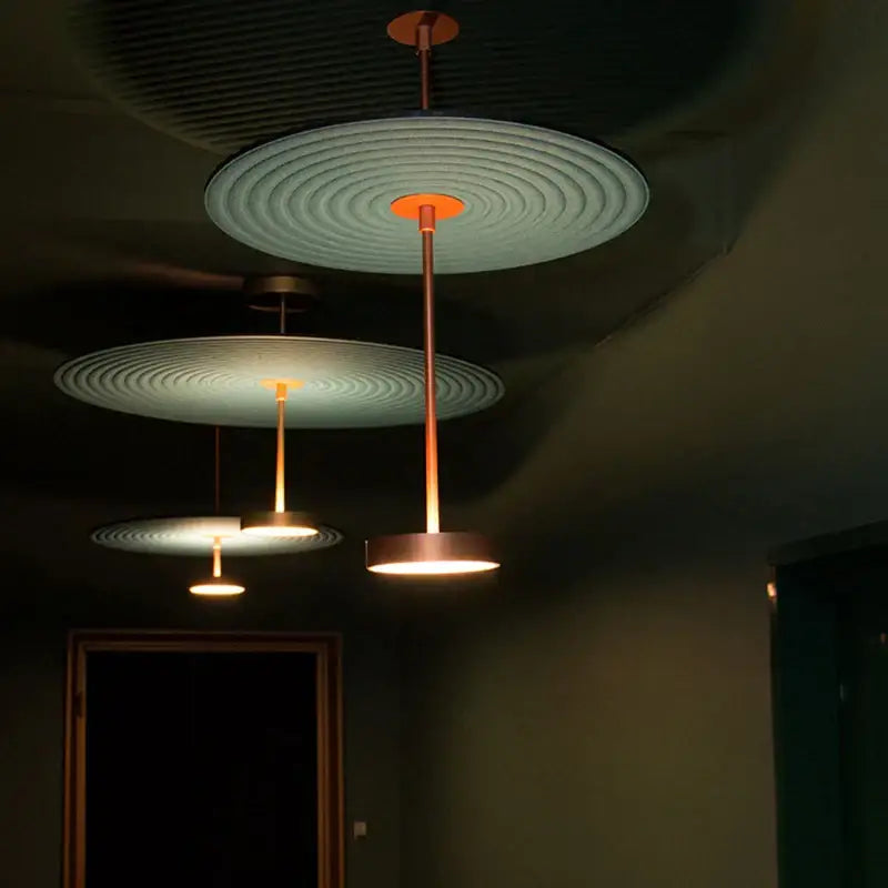 Modern copper-toned decorbites cotton round pendant lights with concentric circular shades for living room decor