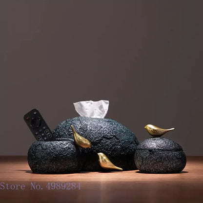 Modern rock textured black stone tissue box with gold bird resin accents for living room decor by decorbites golden bird