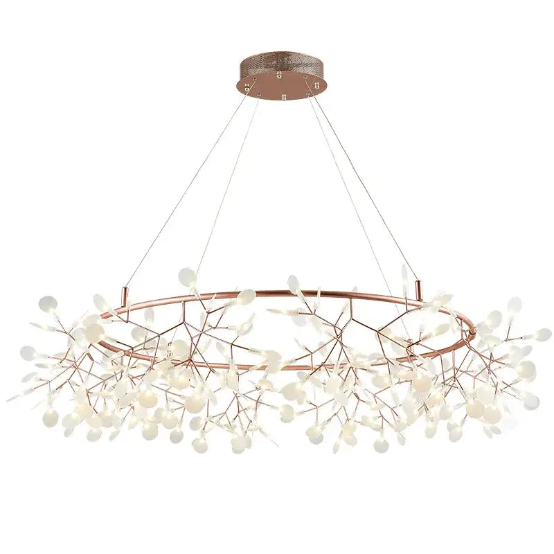 Modern rose gold pendant light with copper-toned branch arms and frosted glass light sources for dining room