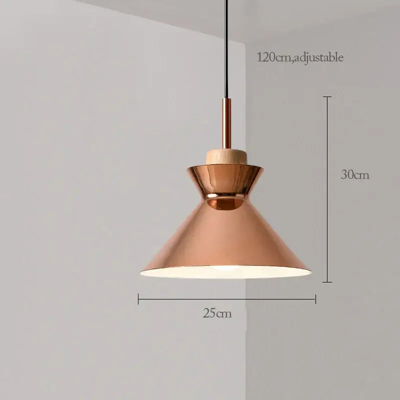 Copper-toned modern rose gold pendant lights with wooden accent and black cord for dining room island decorbites rose gold