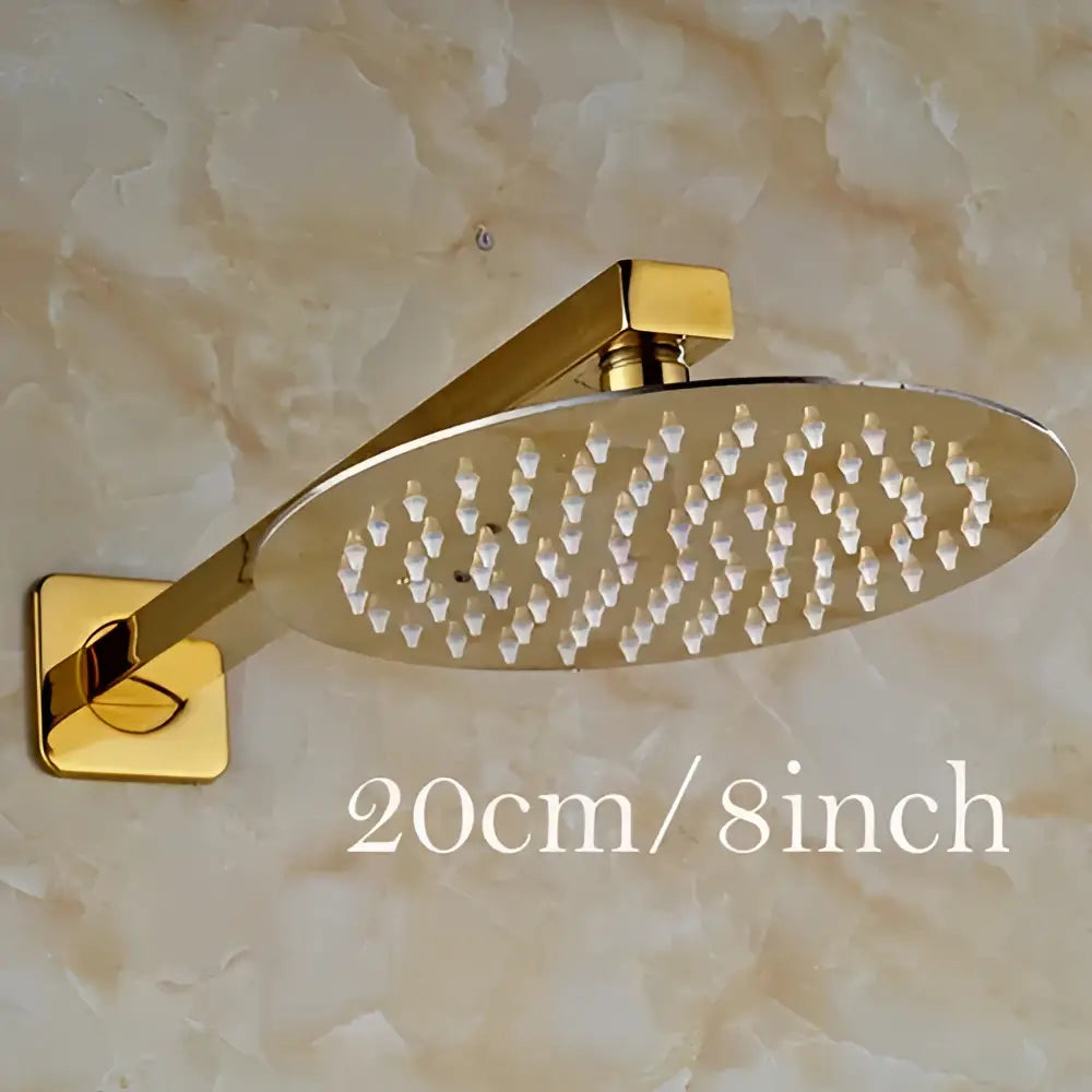 Modern round gold ultrathin rainfall shower head set with sleek metallic finish and multiple water nozzles for bathroom use