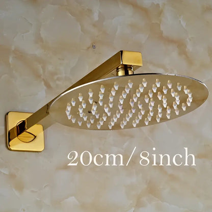 Modern round gold ultrathin rainfall shower head set with sleek metallic finish and multiple water nozzles for bathroom use