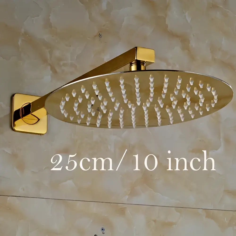 Modern round gold ultrathin rainfall shower head set with sleek metallic finish and multiple water jets shower head