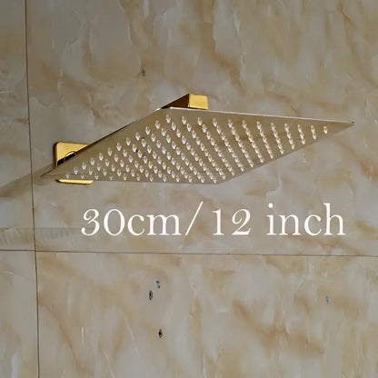 Modern round gold ultrathin rainfall shower head set with a gold-colored square shower head and sleek metallic finish
