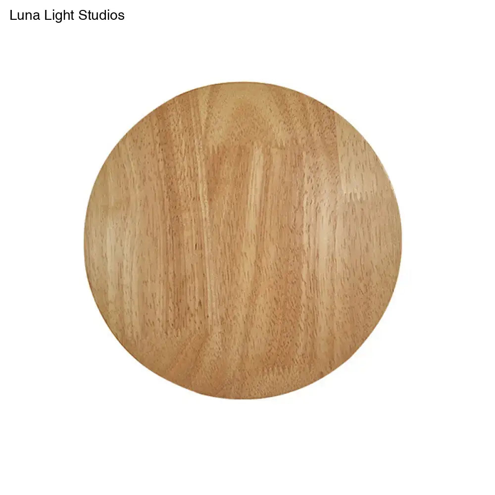 Modern round wood led wall lighting light fixture with light brown circular wooden disc and natural grain patterns for living room