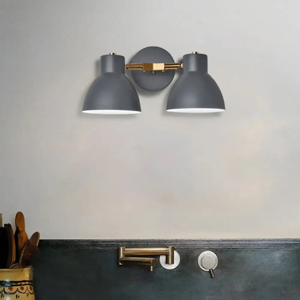Modern sage green and gray double shade wall sconce with brass accents direct wired for living room lighting