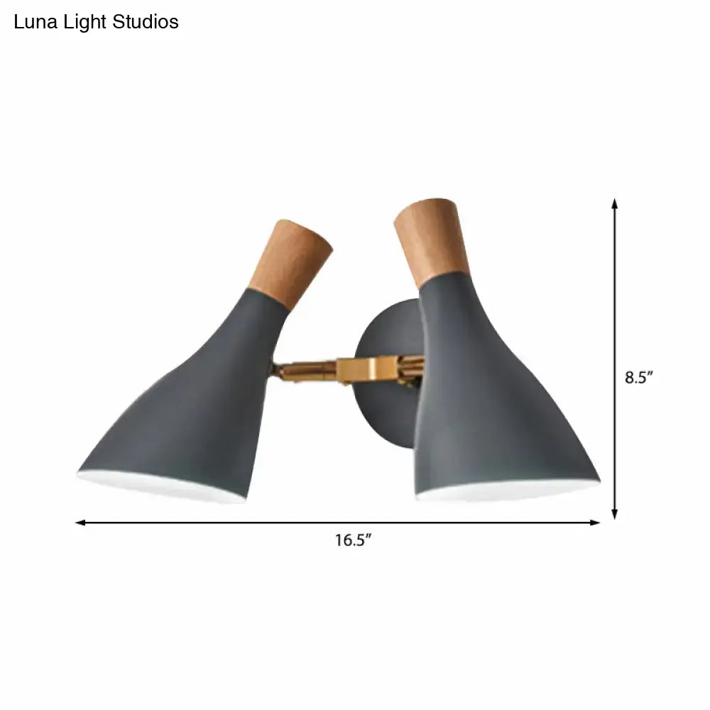 Modern sage green and gray double shade direct wired wall sconce with matte gray shades and warm wood top accents