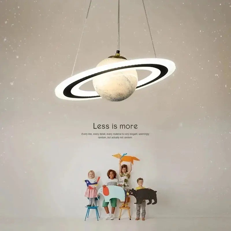 Modern saturn space star astronaut pendant lamp with textured off-white planet body and sleek black rings for boys bedroom