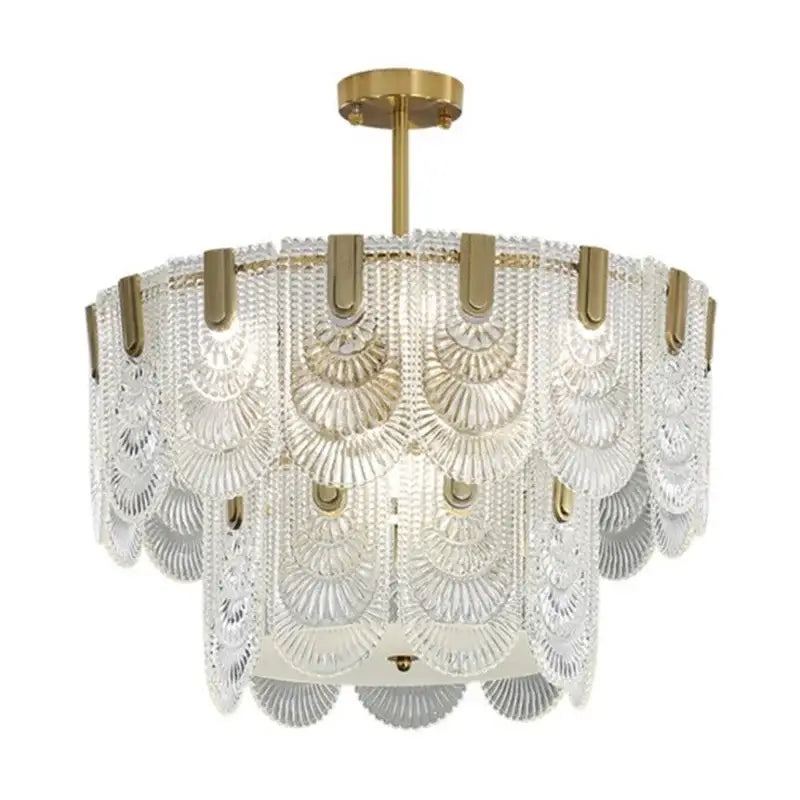 Modern scalloped art glass chandelier with clear glass panels and gold metal accents for dining room decorbites art glass