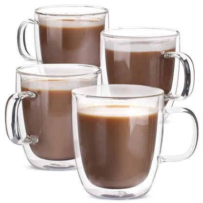Modern set of 4 clear double wall glass coffee cups filled with chocolate milk for kitchen use