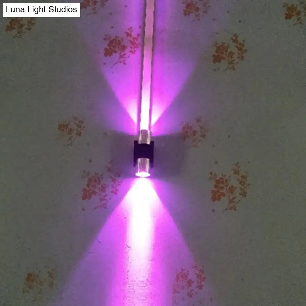 Modern silver aluminum purple led wall light fixture with sleek black base and clear cylindrical housing for bedroom accent lighting