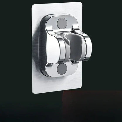 Chrome-finished modern silver and black adjustable shower holder bracket with adhesive backing for wall mounting