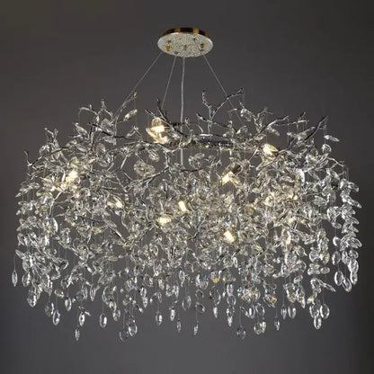 Modern silver and black crystal chrome chandelier with intricate silver branches and teardrop crystals for living room lighting