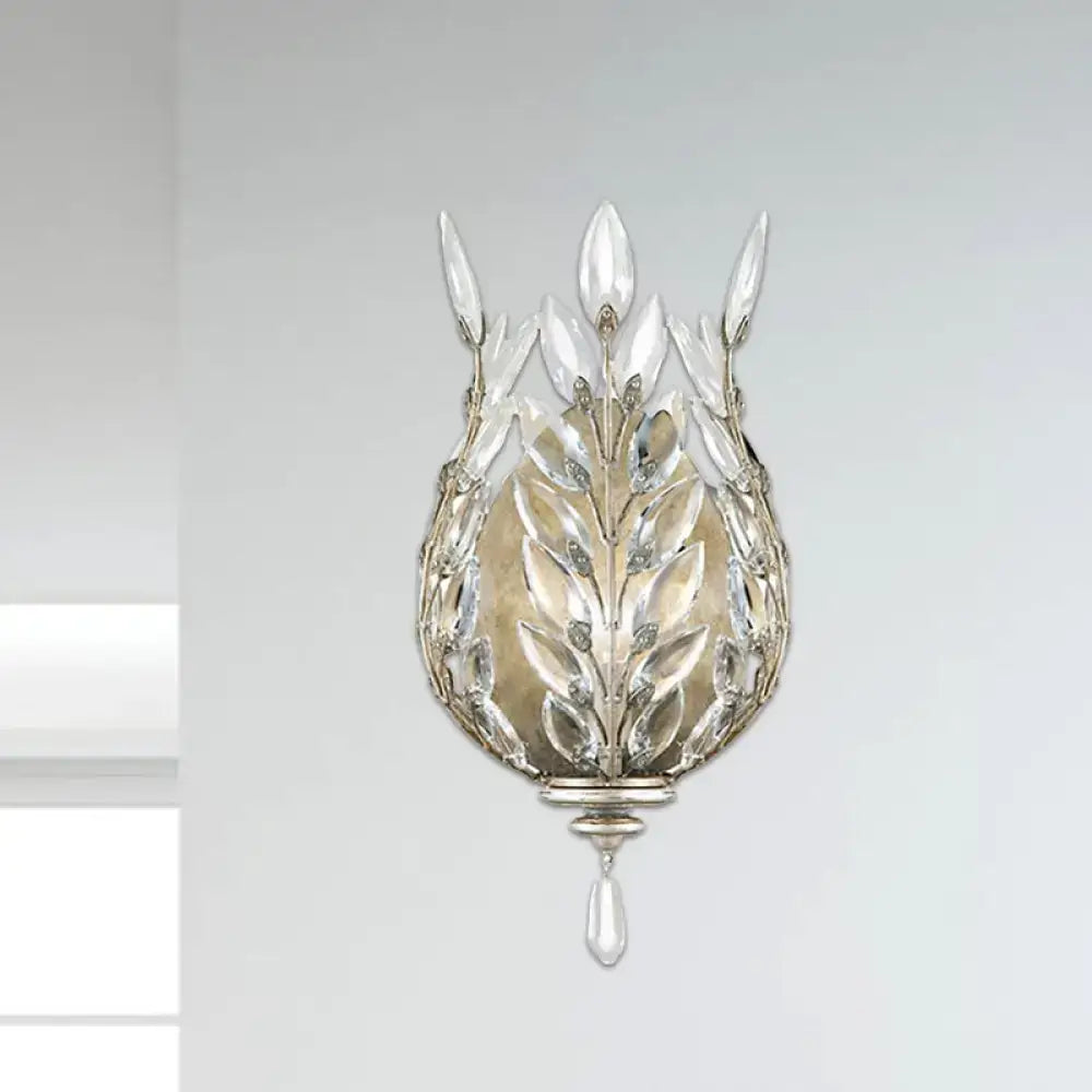 Modern silver and brass wall light with laurel leaf pattern crystal drop and dangling teardrop pendant for bedroom